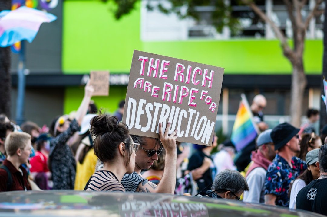 a group of people holding signs