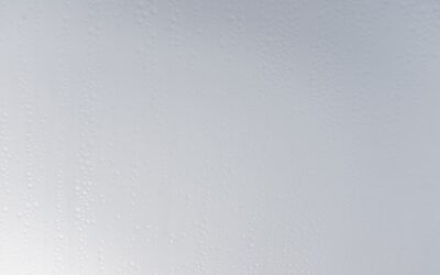 a white wall with water drops on it