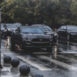 a bunch of cars that are sitting in the street