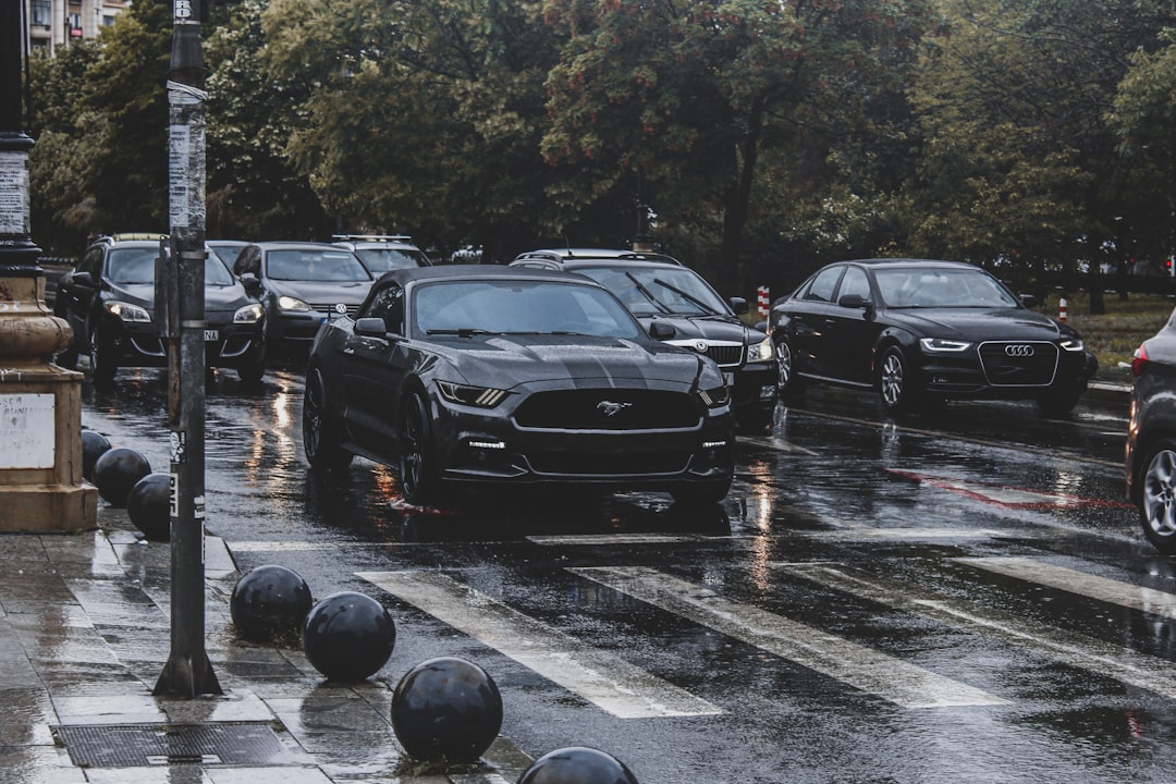 a bunch of cars that are sitting in the street