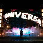 man standing in front of Universal Studio