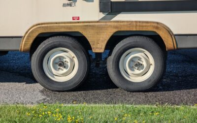A trailer is parked on the side of the road