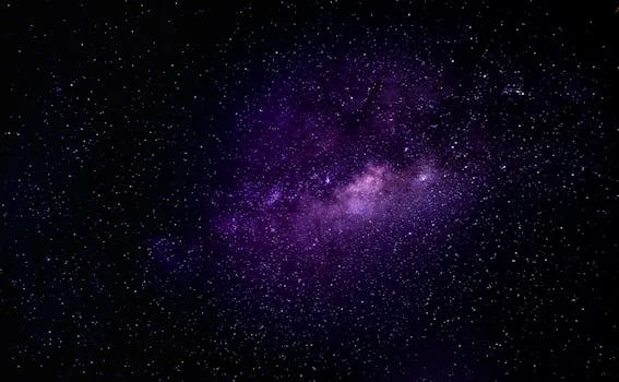 Immersive view of the Milky Way galaxy with vibrant purple hues under a clear night sky.