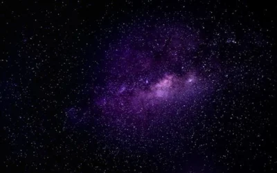 Immersive view of the Milky Way galaxy with vibrant purple hues under a clear night sky.