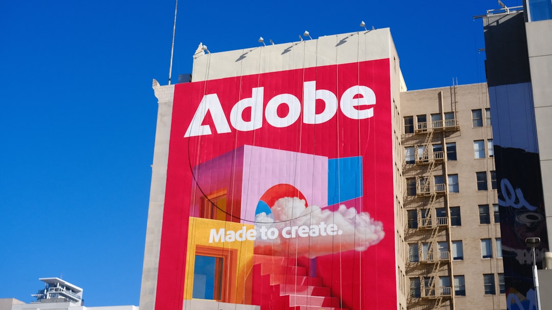 Adobe logo and slogan on a building