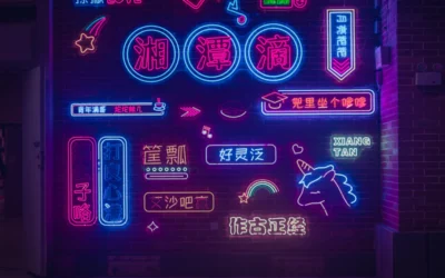 A neon sign that is on the side of a building