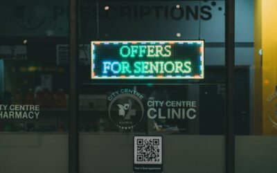City Centre Pharmacy offers for seniors displayed on illuminated signage, encouraging walk-ins.