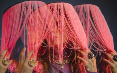 woman wearing pink hats