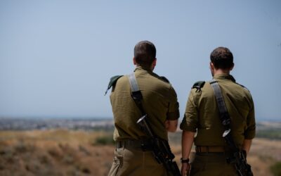 a couple of men in uniform