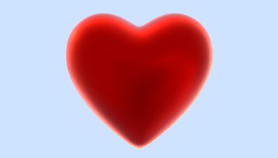 A red heart on a blue background