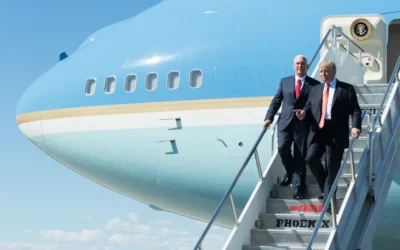 man in black suit standing beside woman in black coat