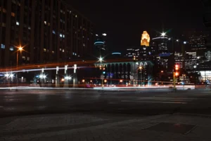 city buildings with lights during night time