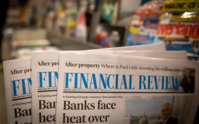 newspapers are stacked on top of each other