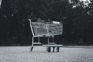 A black and white photo of a shopping cart