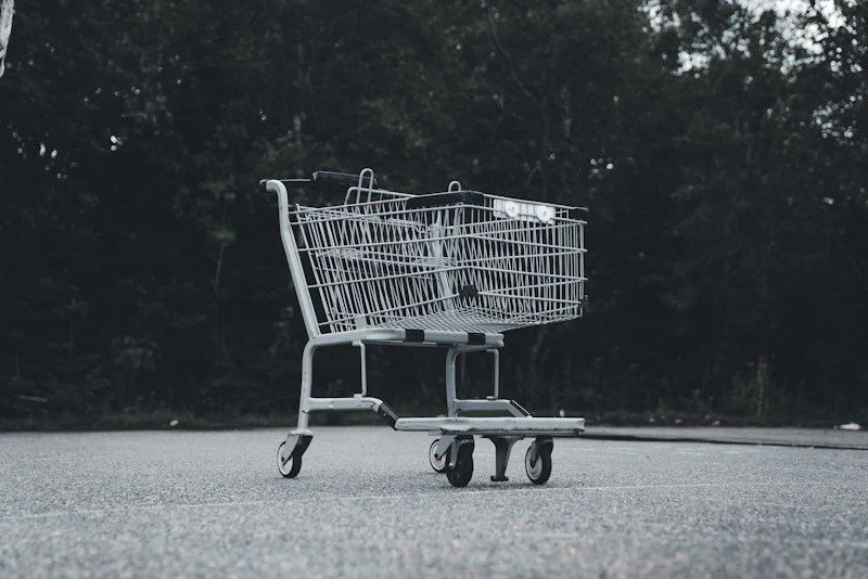 A black and white photo of a shopping cart