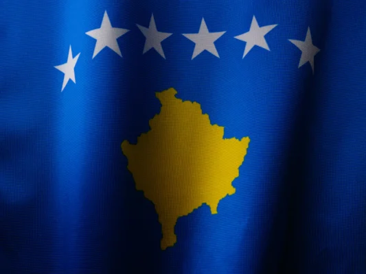 a close up of a flag with five stars