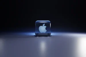 a small blue cube with a white logo on it