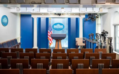 The white house press briefing room is empty.