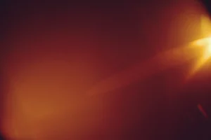 Abstract warm light flare with dark background