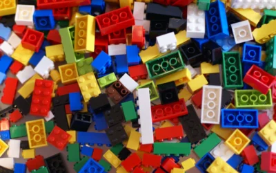 A pile of colorful legos sitting on top of a table