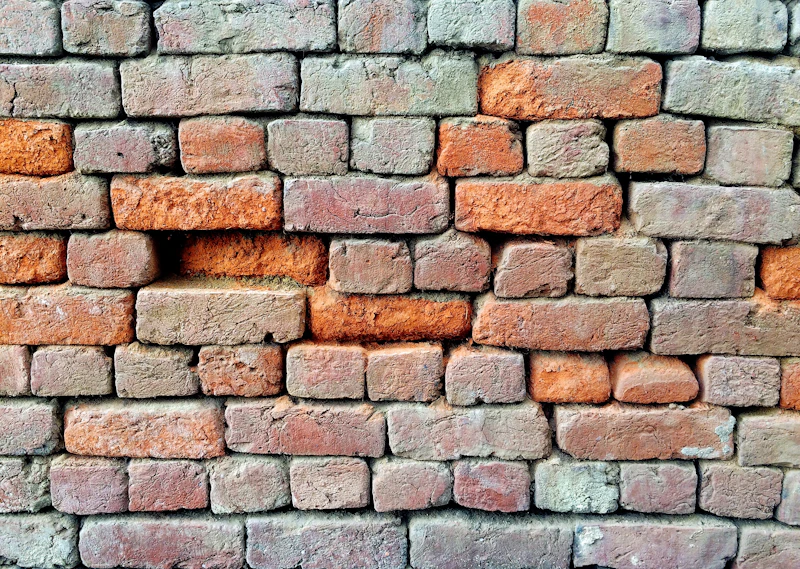 brown and gray brick wall