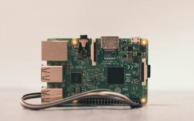 a close up of a motherboard with wires attached