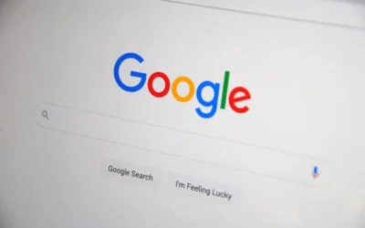 Close-up of the Google homepage on a screen showing search options.