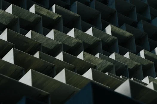Dynamic geometric pattern of an architectural facade in Toronto, showcasing modern design.