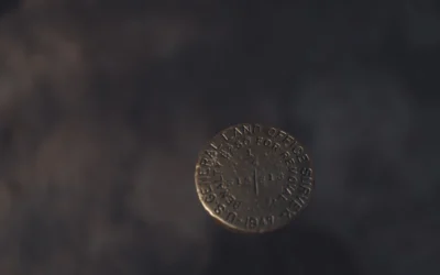 a close up of a coin on a table