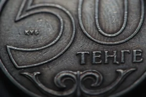 a close up of a coin with the number 50 on it