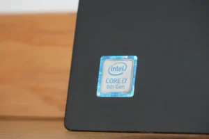 Intel core i7 sticker on a dark surface.