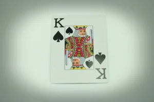 a playing card with a king of hearts on it