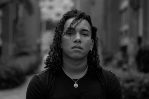 woman in black shirt in grayscale photography