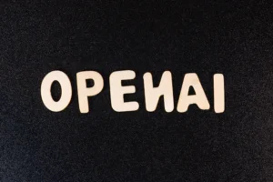 a close up of a black surface with white letters