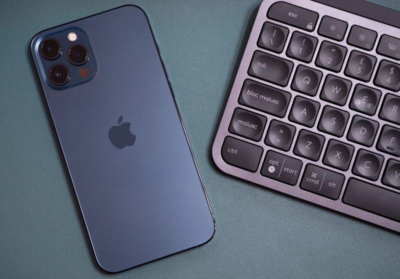 silver iphone 6 on blue surface