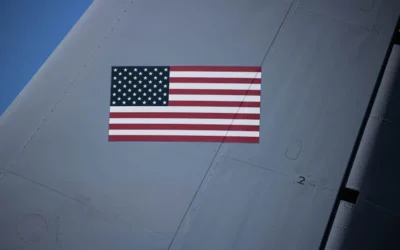 an american flag on the side of an airplane