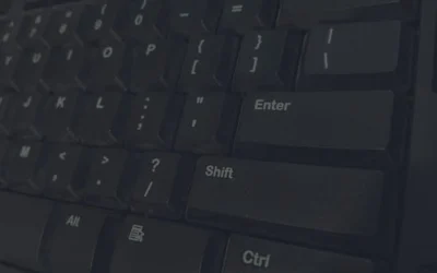Detailed shot of black computer keyboard showcasing various keys for technology concepts.