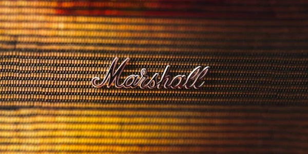 Detailed close-up of a Marshall speaker logo showcasing its classic design.