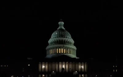 a building with a dome roof at night