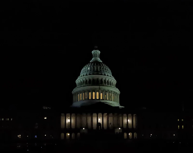 a building with a dome roof at night