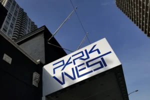 a sign that is on the side of a building