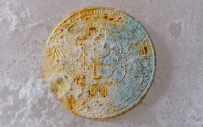 a dirty round object sitting on a white surface