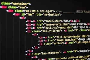 Close-up of vibrant HTML code displayed on a computer screen, showcasing web development and programming.