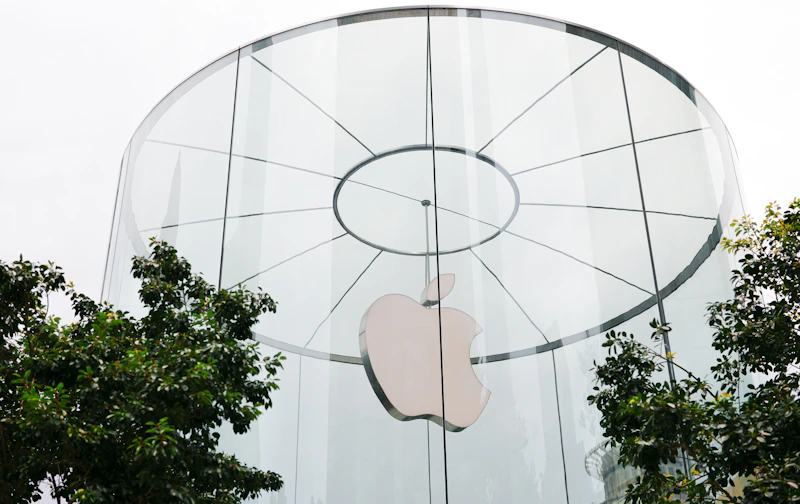An apple logo on the side of a building