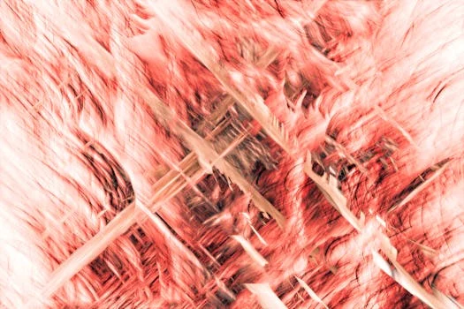 Swirling red and beige textures creating a dynamic abstract art piece full of motion.