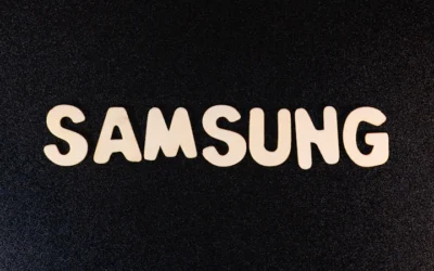 a close up of a samsung logo on a black surface