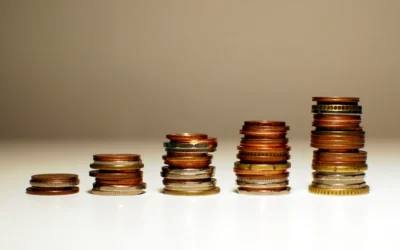 Stacks of coins increasing in height from left to right.