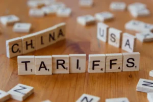A close up of scrabble tiles spelling the word china