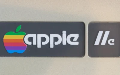 a close up of a sign with an apple logo