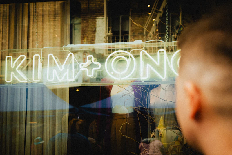 Neon sign for "kim + ono" brand.